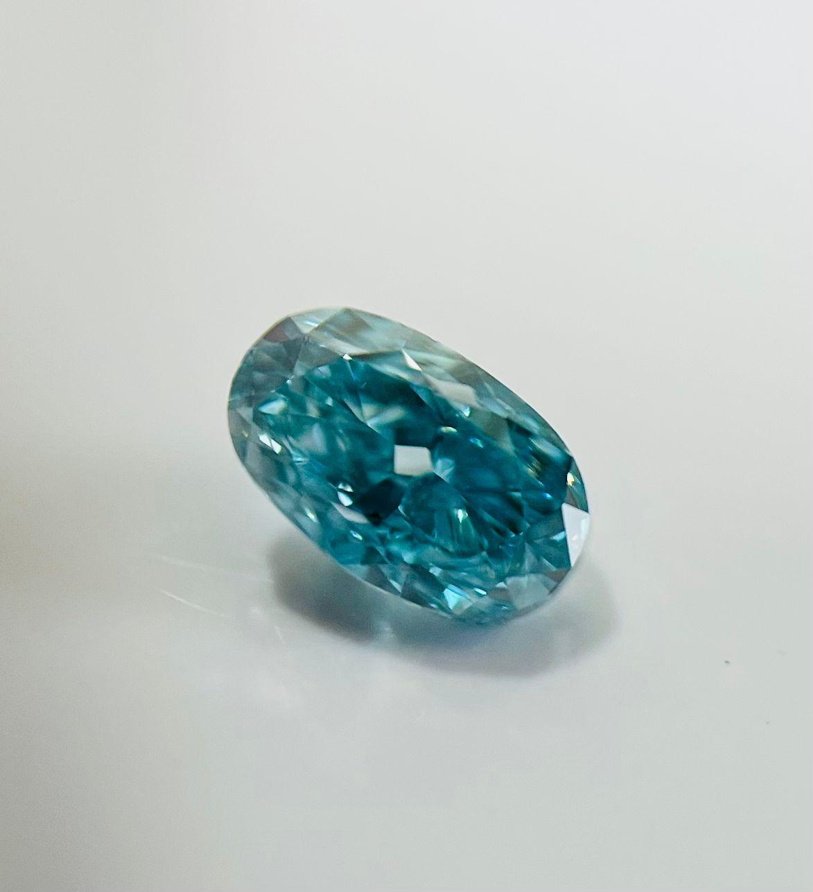 Fancy Vivid Blue-Green Cushion Modified Brilliant Diamond
