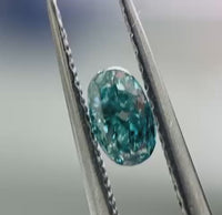 Fancy Vivid Blue-Green Cushion Modified Brilliant Diamond